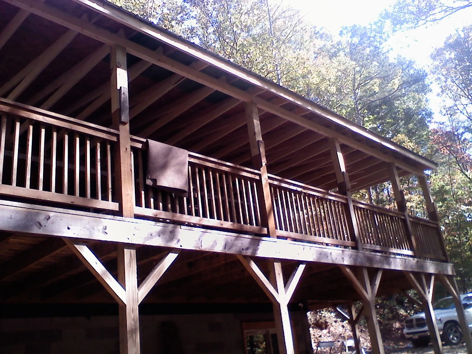Timber framing under a new elevated porch and deck in Martins Creek